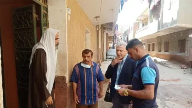 تسليم بطاقة ميزة لأحد مستفيدي تكافل وكرامة